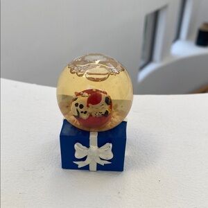 Disney holiday Blue Snow Globe with Dalmatian. Water discolored.